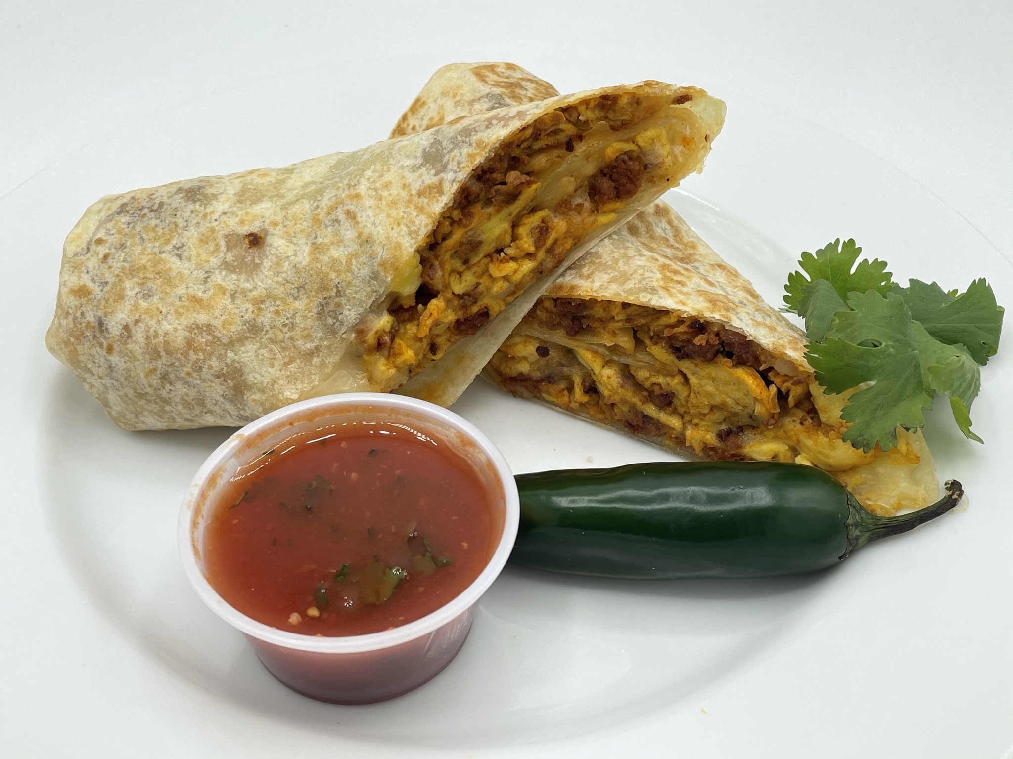 Chorizo breakfast burrito with salsa
